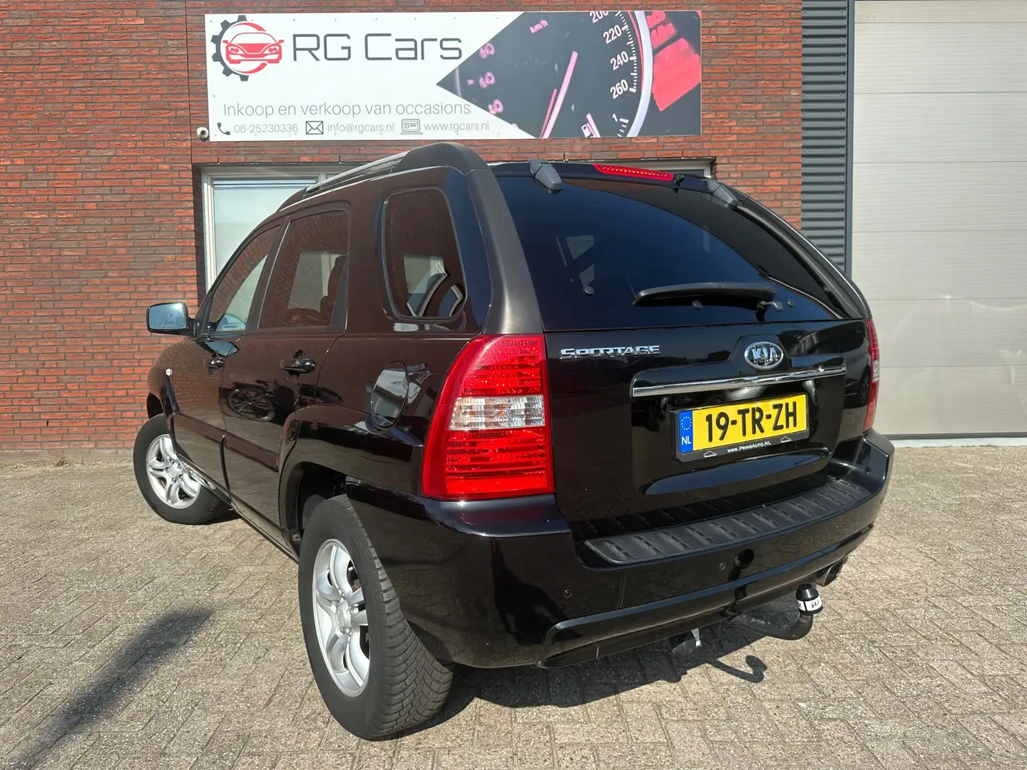 Kia Sportage 2.0 CVVT M-bition / Navi / Leder / PDC / Cruise / Schwarz - 2
