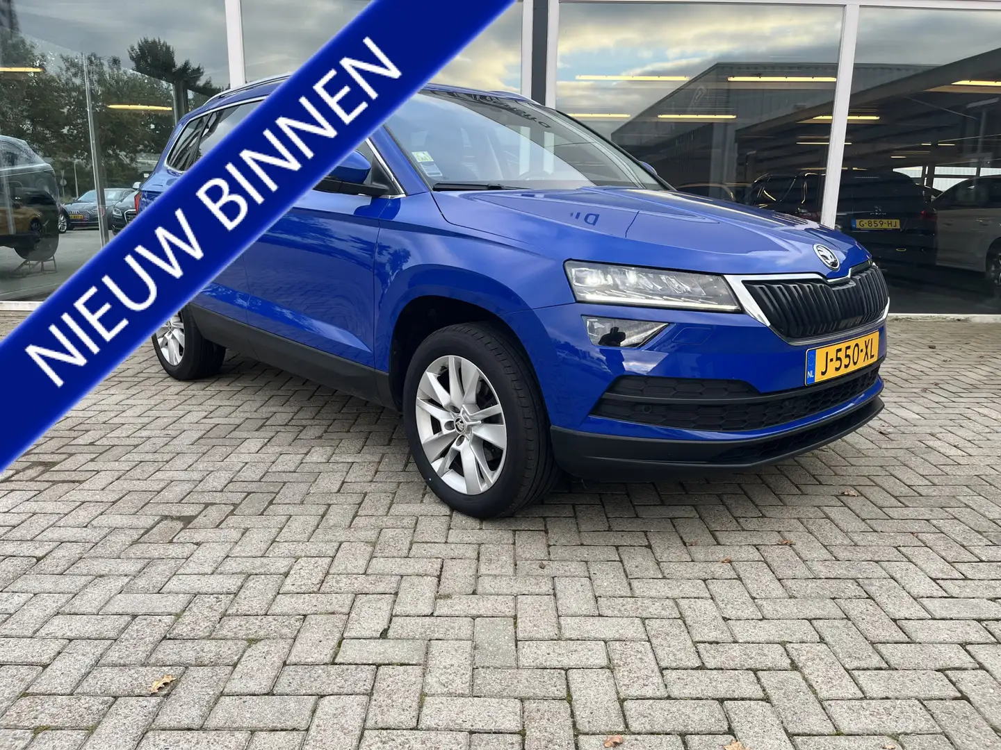 Skoda Karoq 1.0 TSI Business Edition Plus / Pano / LMV / Virtu Blauw - 1