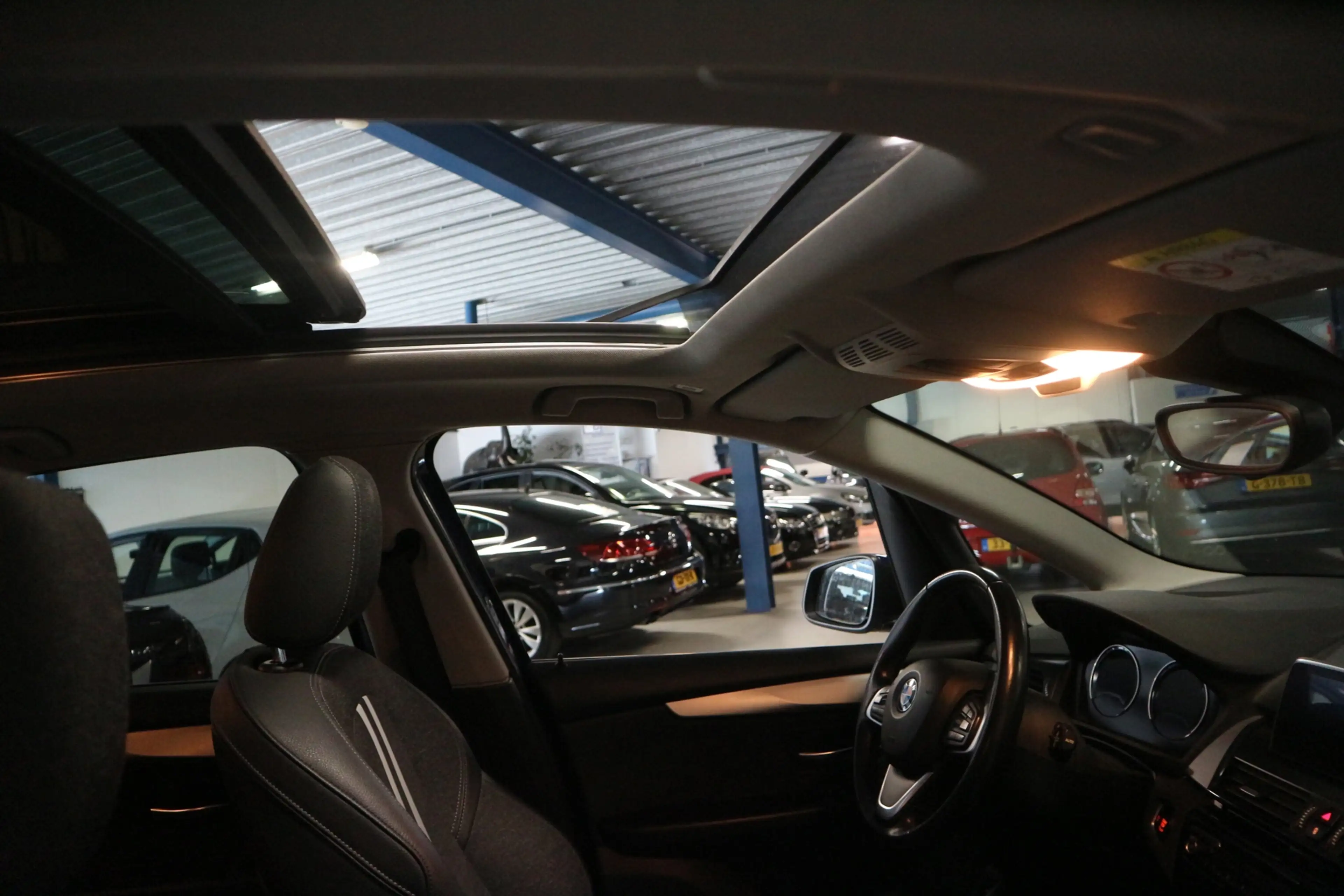 BMW 218 2-serie Active Tourer 218i AUT + PANO + SPORT + XE — photo 7