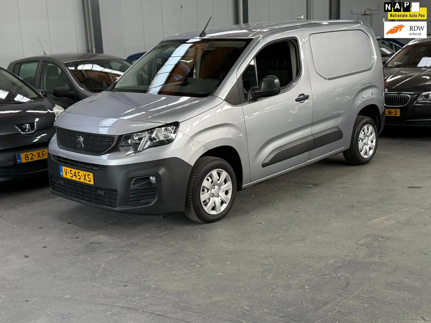 Peugeot Partner 1.6 BlueHDI Premium 2de Eigenaar Grigio - 1