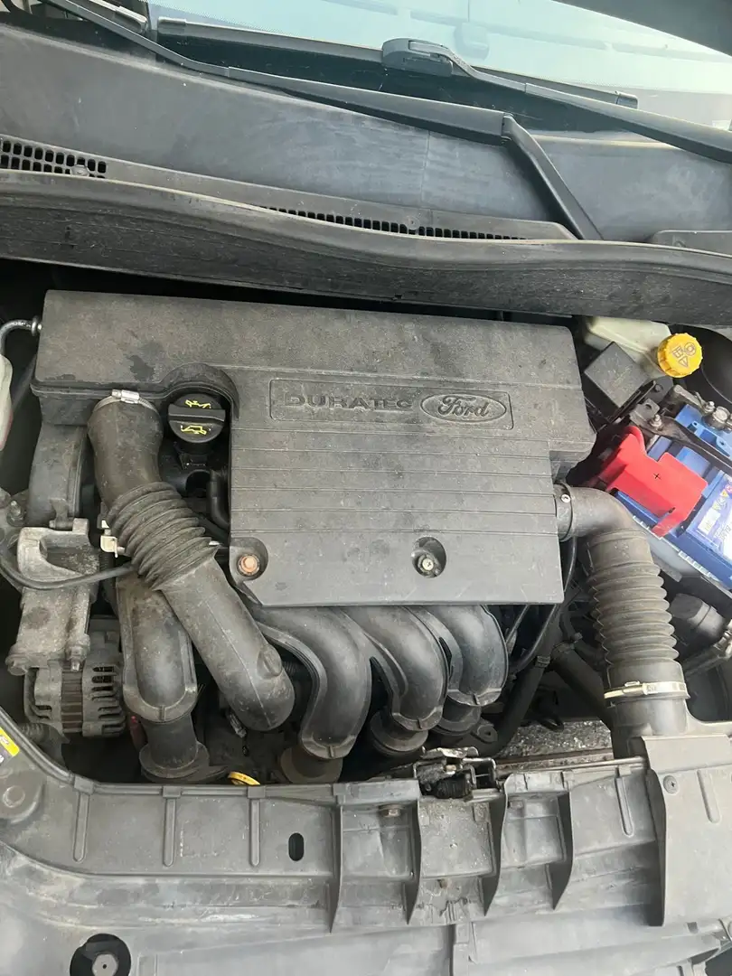 Ford Fusion 1.6 + - 1