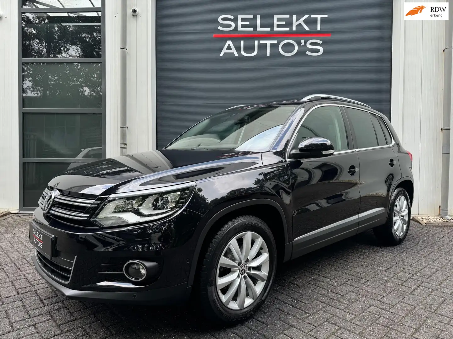 Volkswagen Tiguan 1.4 TSI Sport & Style 122 Pk Pano/Xenon/Led/Navi/C Noir - 1