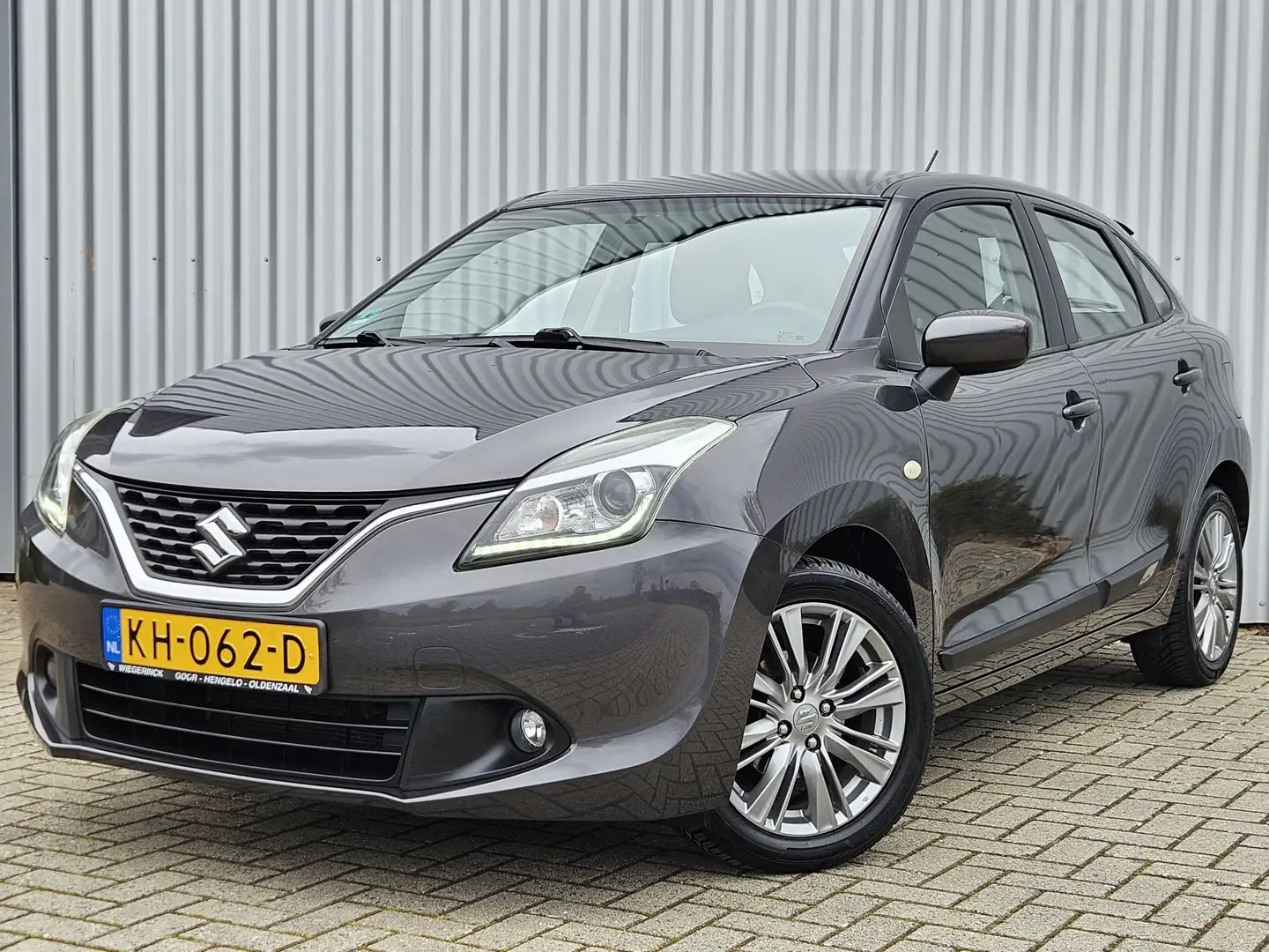 Suzuki Baleno 1.2 Exclusive /Automaat/Stoelverwarming/Cruise! Grau - 1