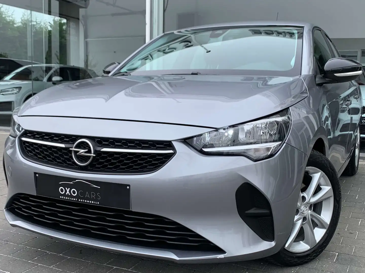 Opel Corsa 1.2i / Airco / Gps / Cruise / Camera /CarPlay/PDC Grijs - 1