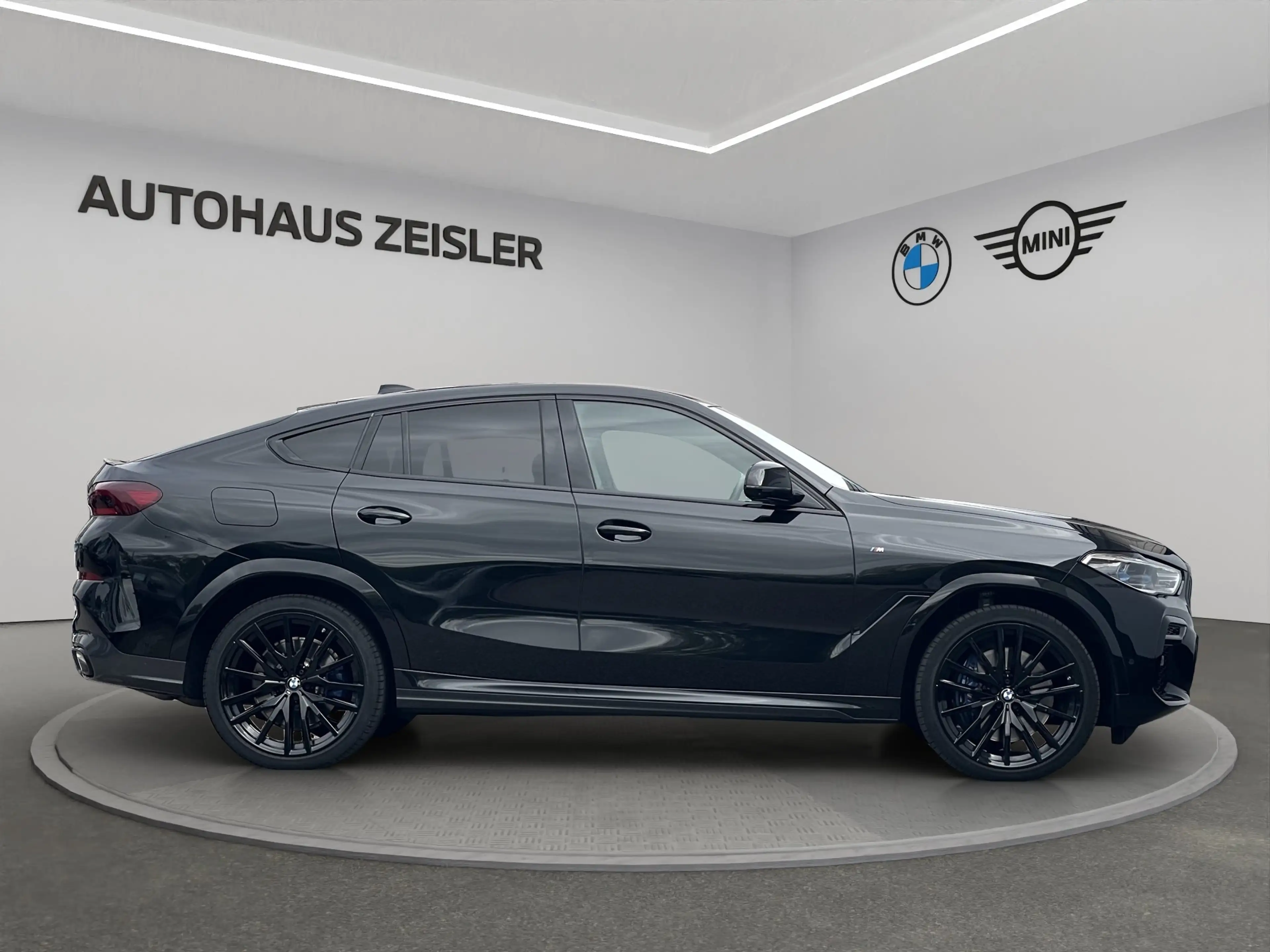 BMW X6 M50i — photo 3