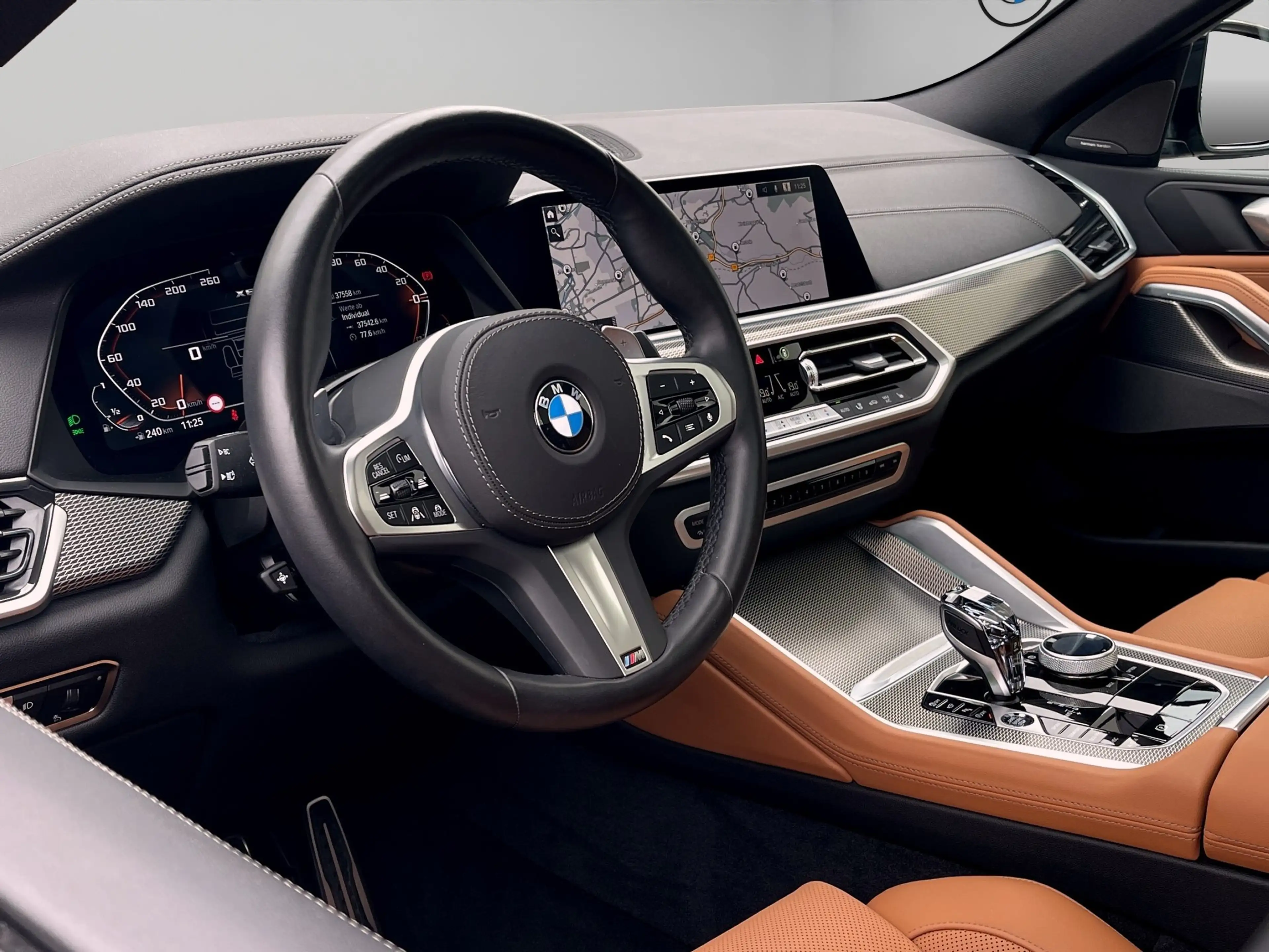 BMW X6 M50i — photo 7