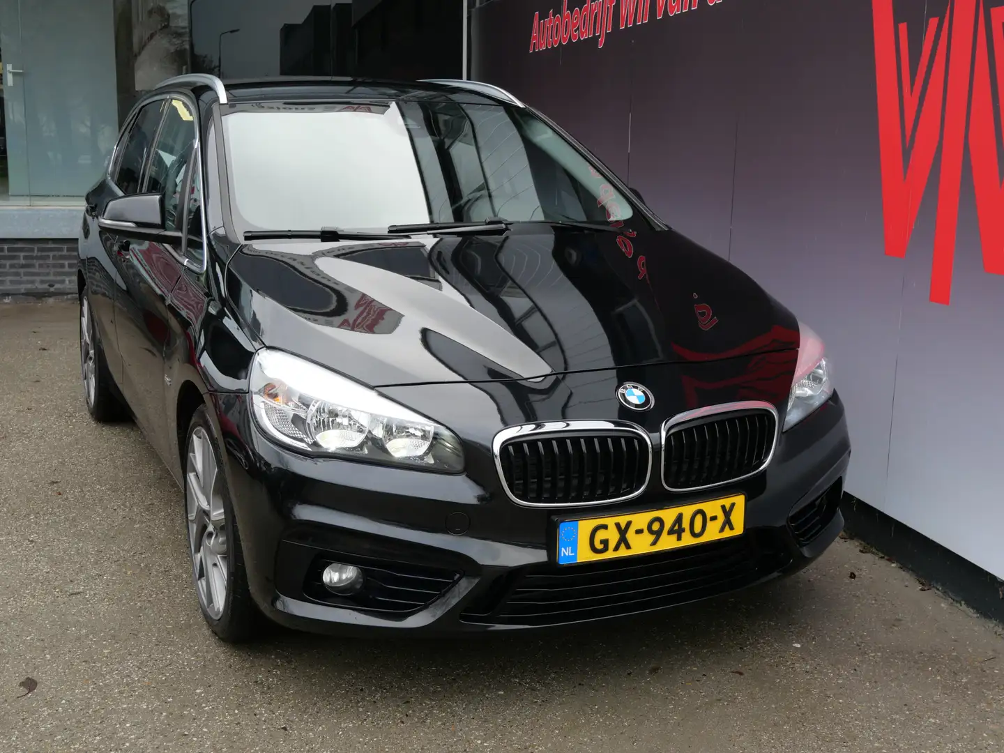 BMW 220 2-serie Active Tourer 220i SPORTLINE | LEER | NAVI Zwart - 2