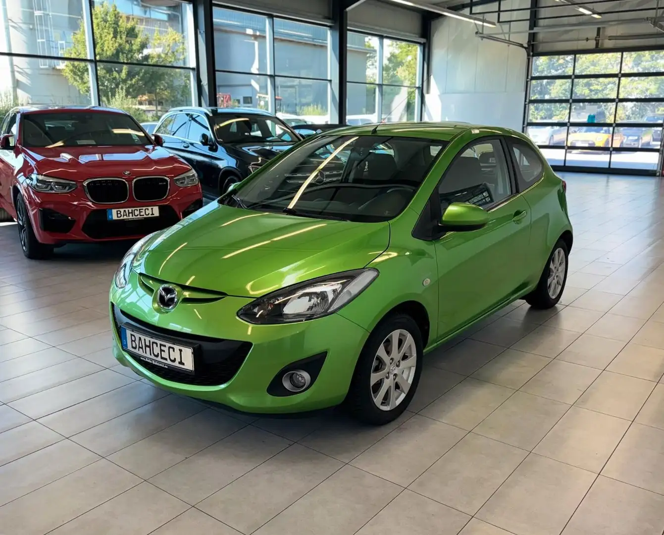 Mazda 2 Lim. 1.3 Edition*SHZ*Klima*AUX*HU* NEU Grün - 1