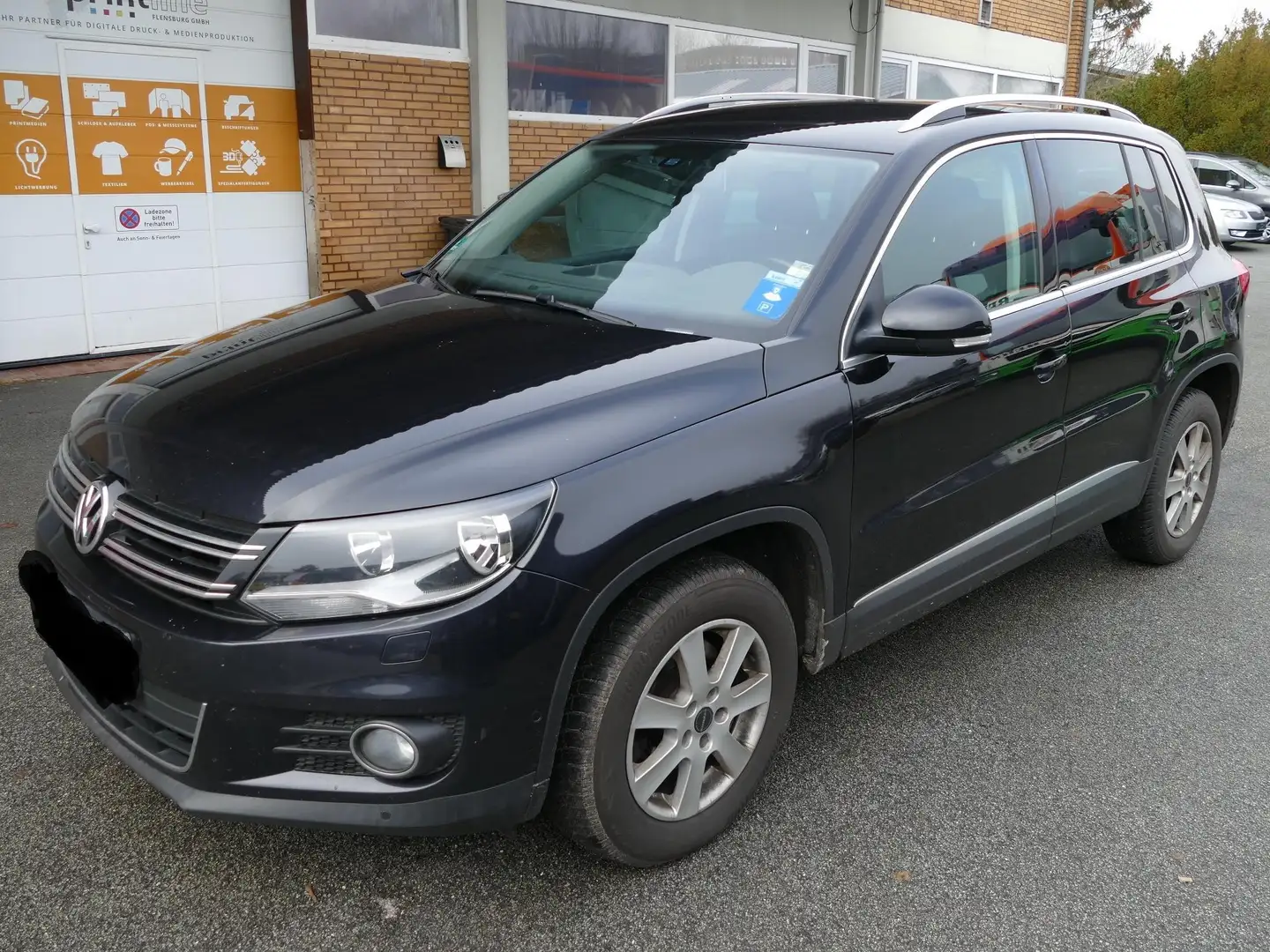 Volkswagen Tiguan 2.0 TDI BMT 4 Motion Klima Einpark Parkassistent Schwarz - 1