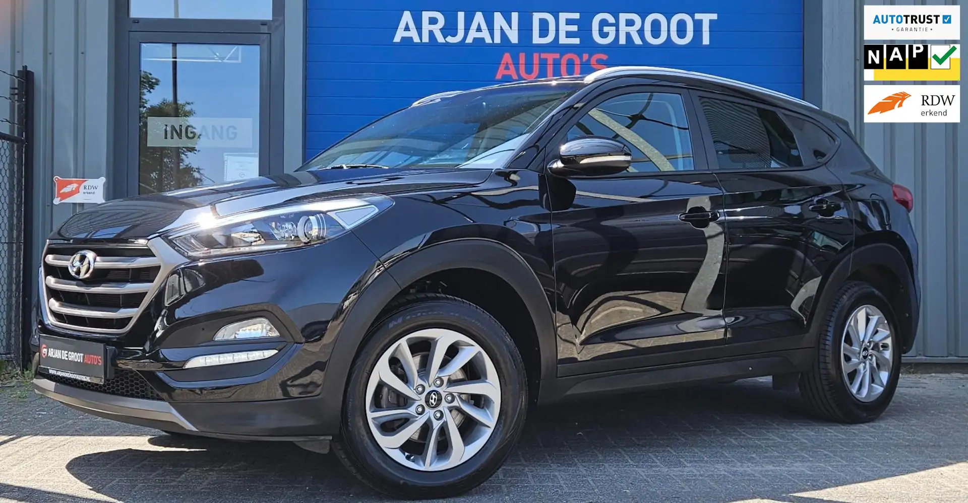 Hyundai TUCSON 1.6 GDi 132PK Navigatie Cruise Climate Camera LM v Zwart - 1