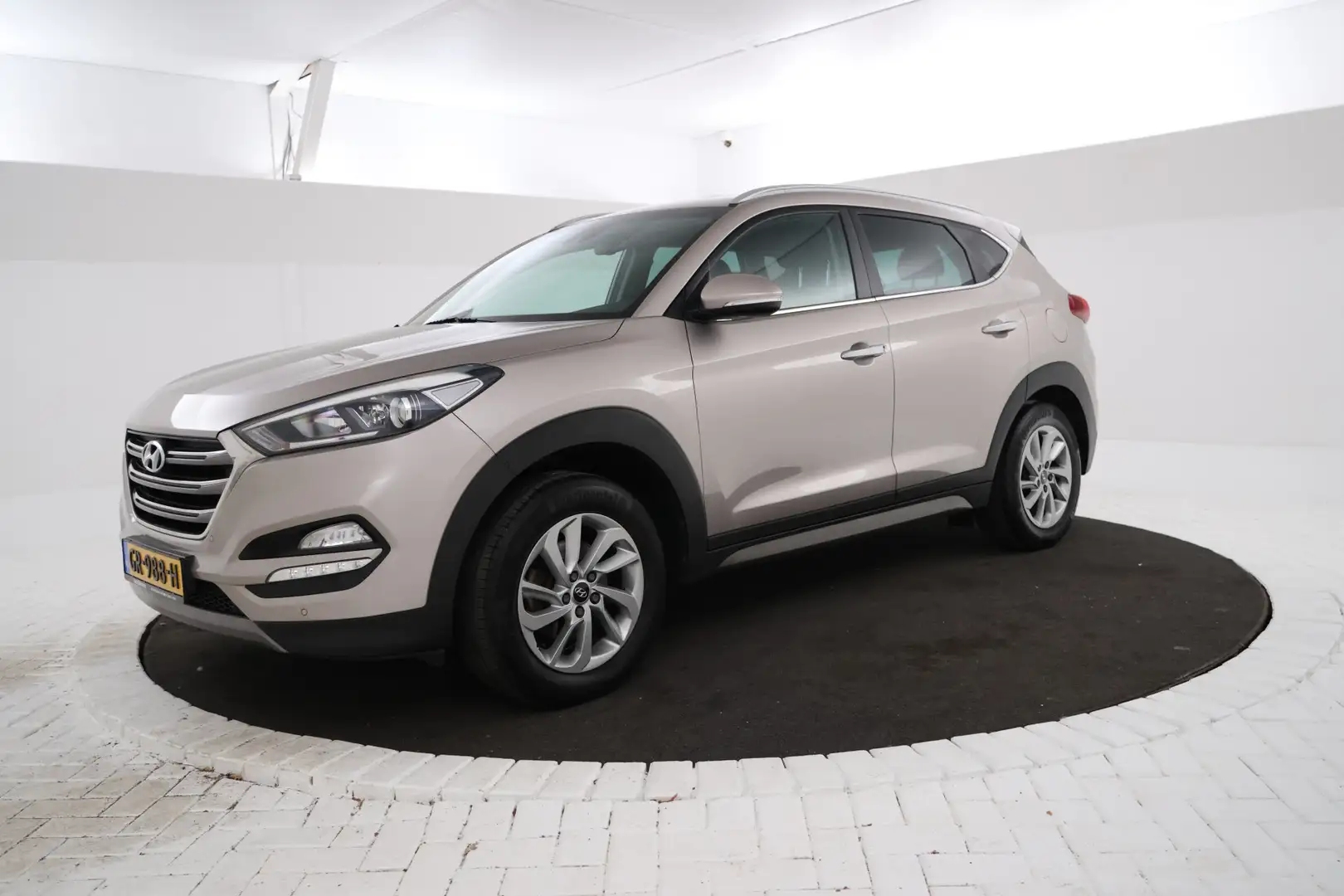 Hyundai TUCSON 1.6 GDi Comfort Navigatie, Climtate, Stoelverw, Beige - 1