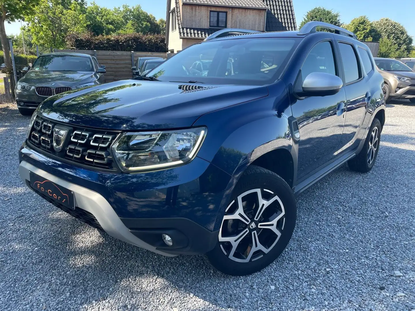 Dacia Duster 1.5 dCi Prestige EDC Automaat Navi Euro 6b Blauw - 1