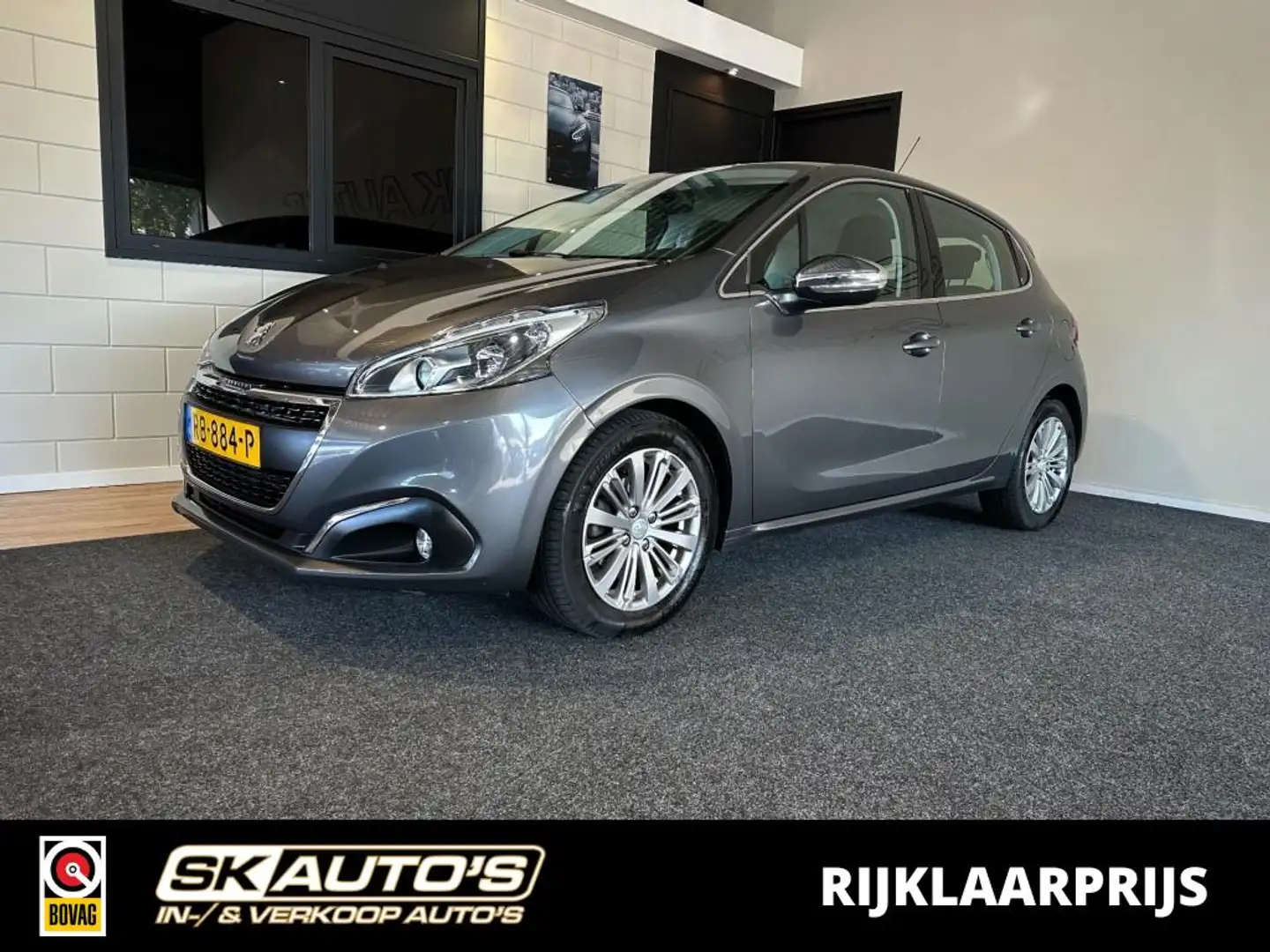 Peugeot 208 1.6 BLUEHDI BL EXEC l NAP l CARPLAY l LMV l CLIMA Grijs - 1
