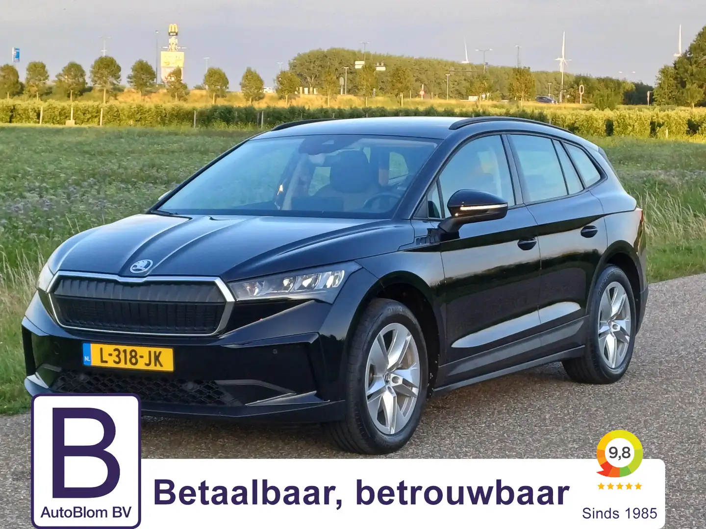 Skoda Enyaq iV 60 /Trekhaak/Navi/Camera/NL/Lage KM/ Zwart - 1