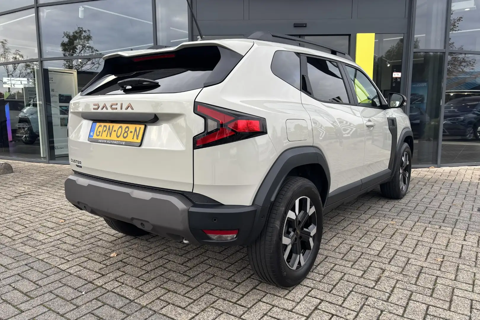 Dacia Duster 1.6 Hybrid 140 Extreme | Rondom camera | PDC voor Bruin - 2