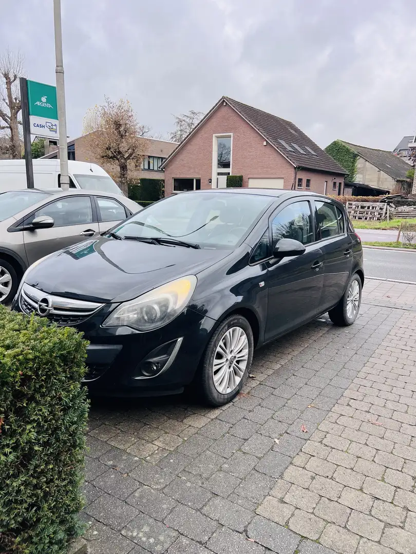 Opel Corsa 1.2i Airco navi Sensoren 1ste Eigenaar top Staat - 1