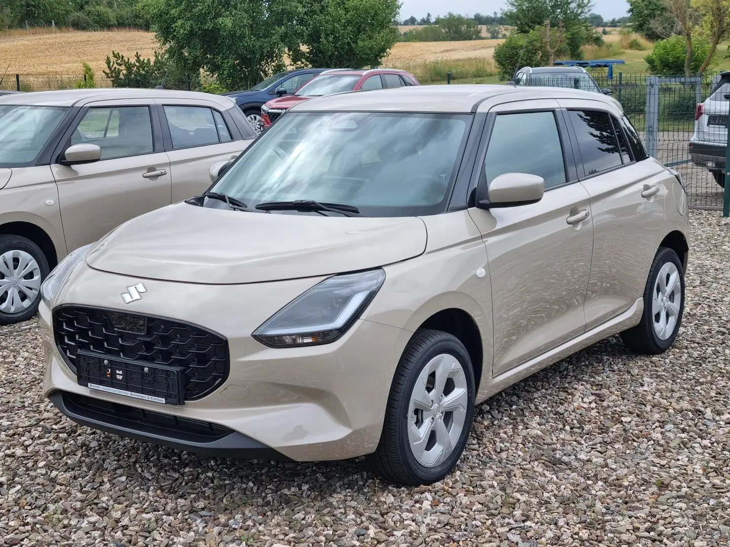 Suzuki Swift 1.2 Hybrid MT Allgrip Comfort Beige - 1
