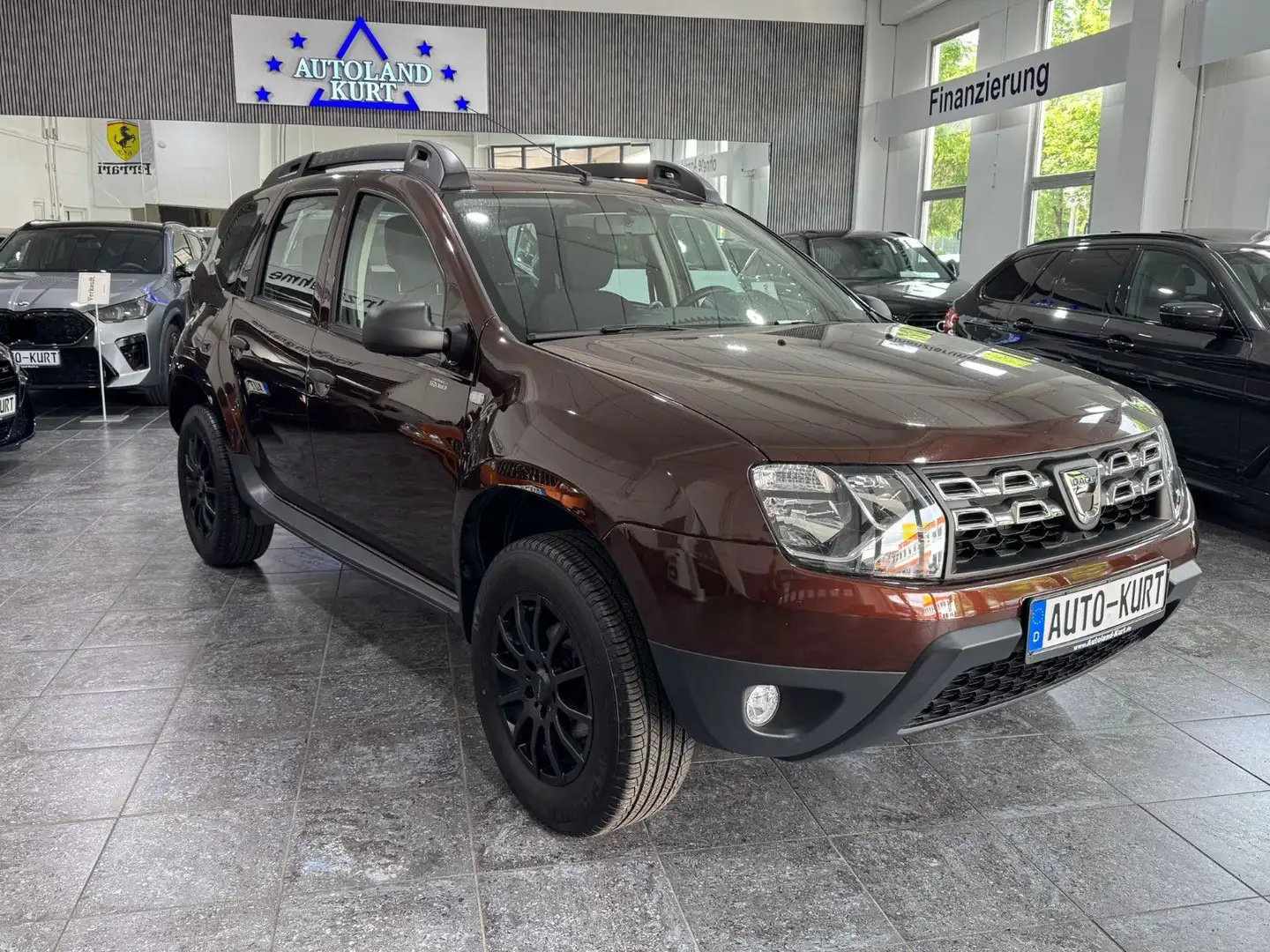Dacia Duster 1,6l 4x2*Klima*Alu*BT*1.Hand Brun - 1