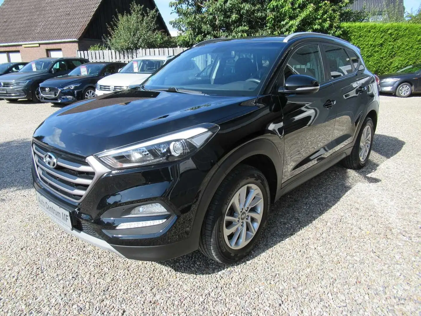 Hyundai TUCSON 1.6 GDi Navi Schwarz - 1