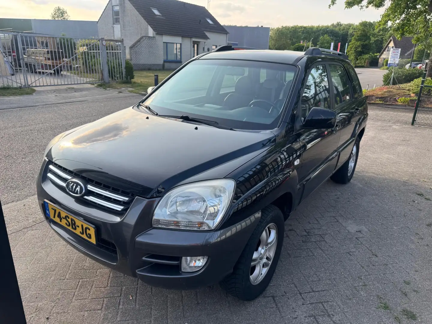 Kia Sportage 2.0 CVVT Executive Airco Zwart - 1