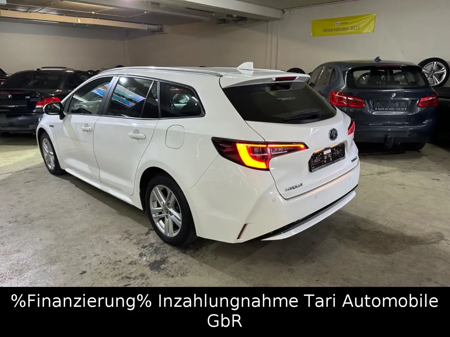 Toyota Corolla Touring Sports Hybrid Business Edition Wit - 1