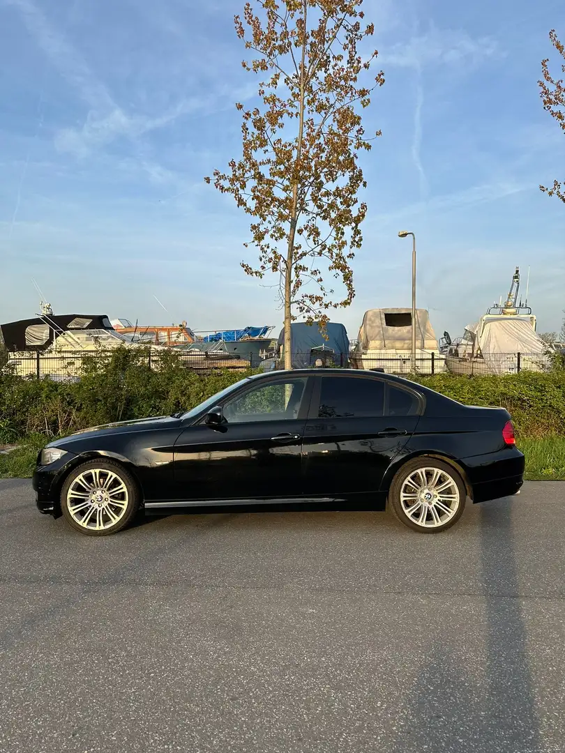 BMW 320 BMW 3-Serie 2.0 1 320 AUT 2009 Zwart Zwart - 2