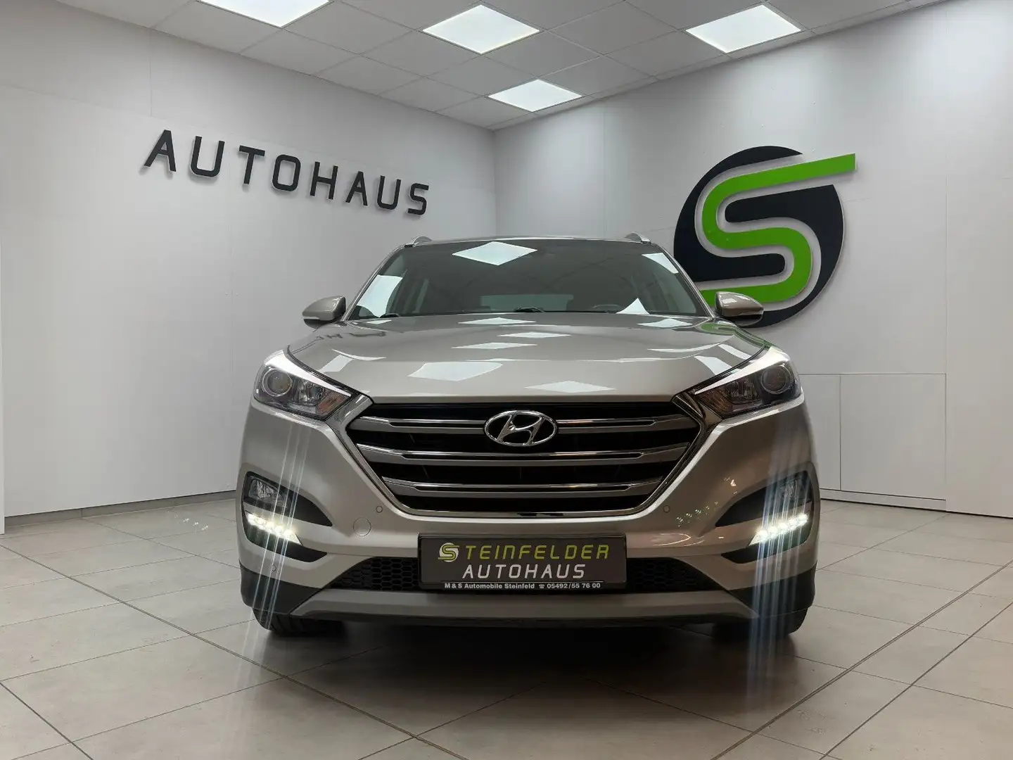 Hyundai TUCSON 1.6 Style 4WD/SHZ/LHZ/NAVI/R-KAMERA/TEMPO Braun - 2