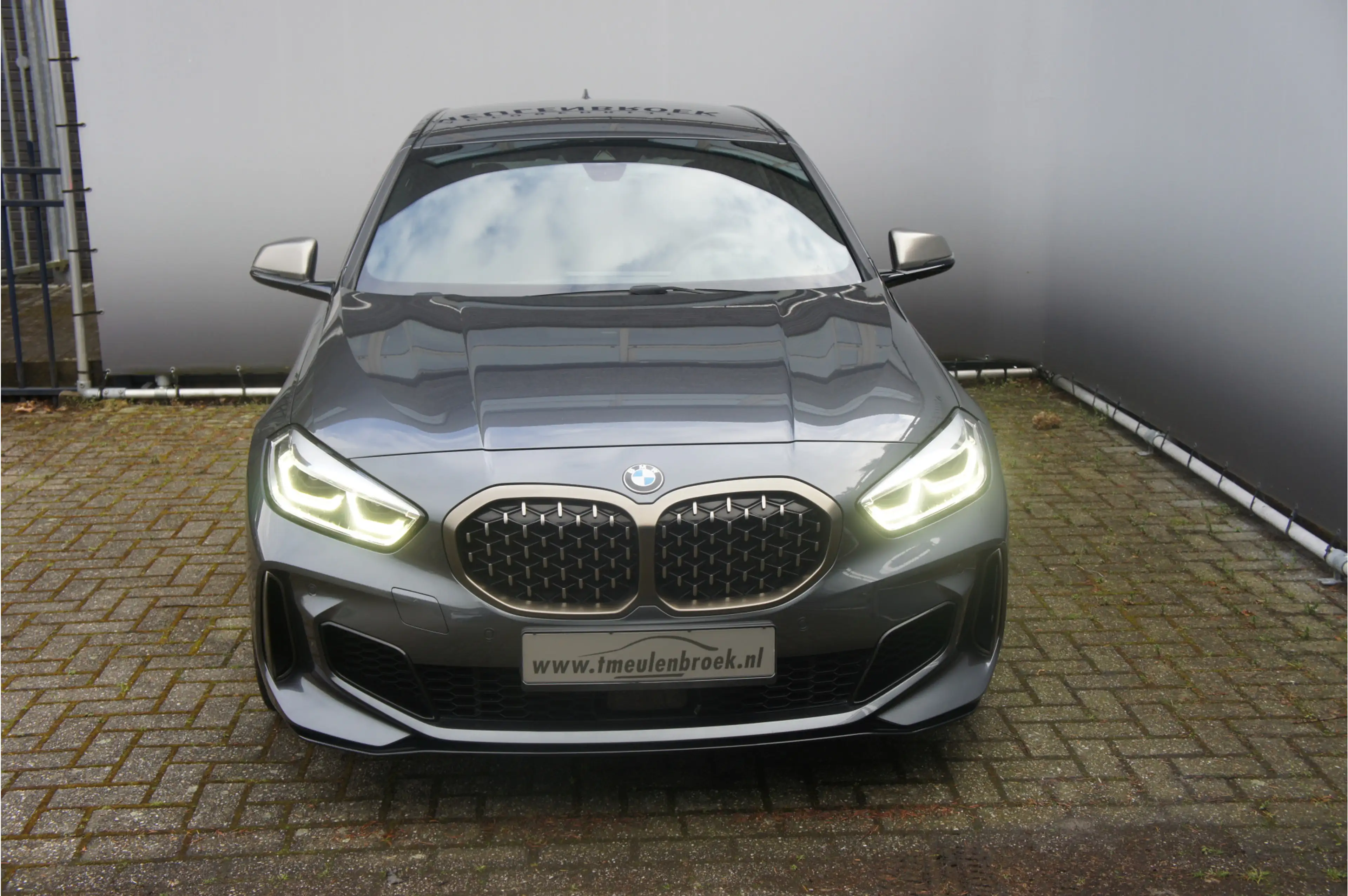 BMW 135 1-serie M135i xDrive High Executive — photo 7