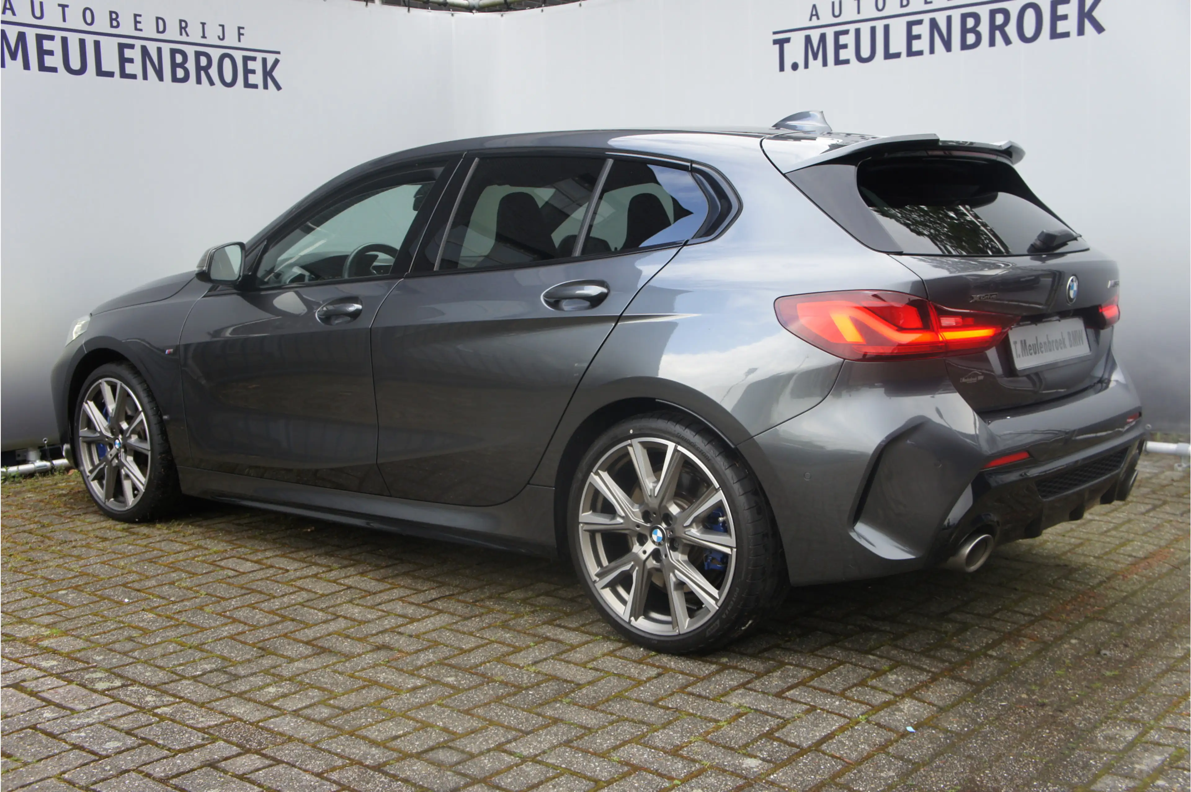 BMW 135 1-serie M135i xDrive High Executive — photo 2