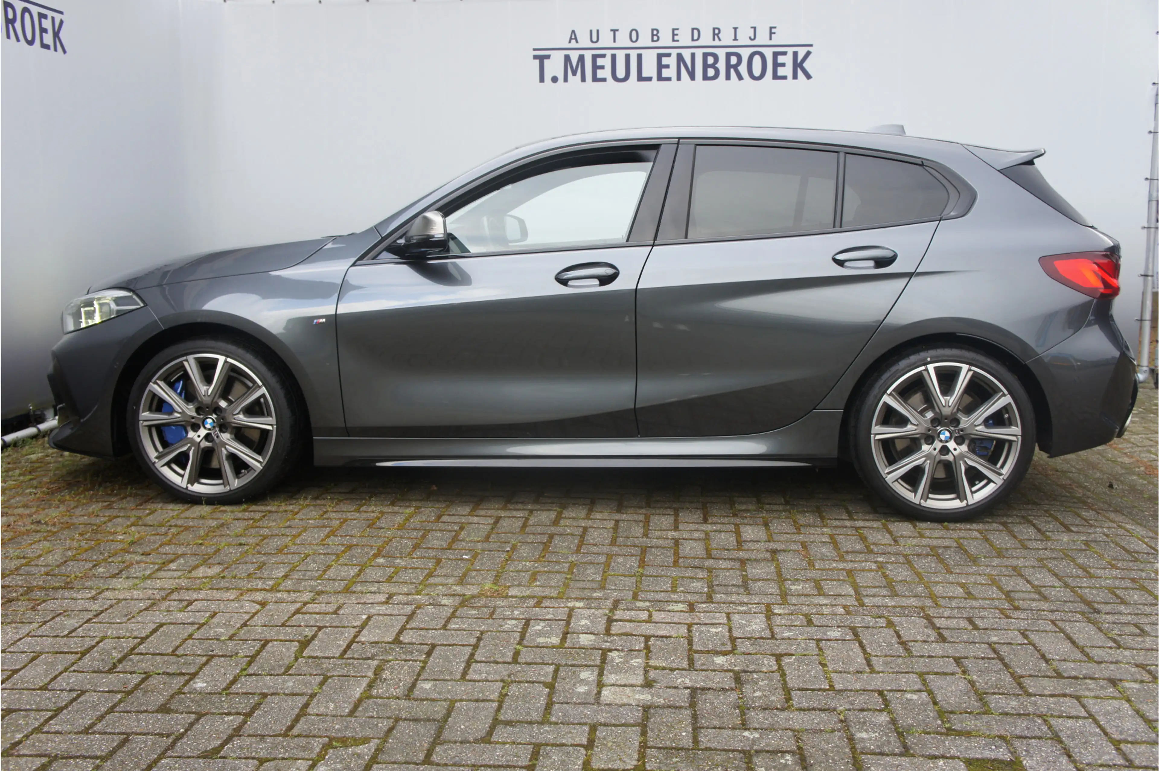 BMW 135 1-serie M135i xDrive High Executive — photo 4