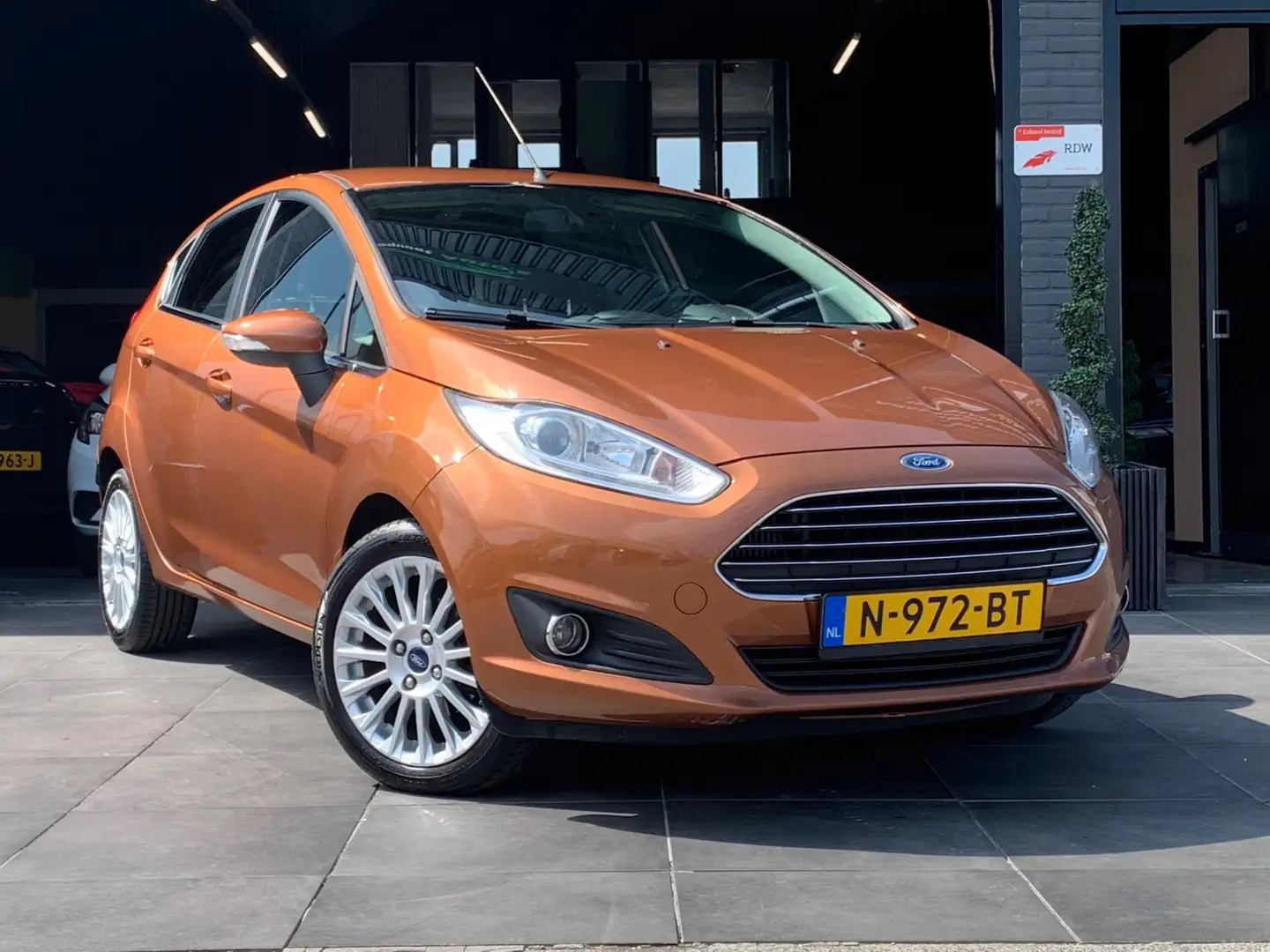 Ford Fiesta 1.0 EcoBoost Titanium|AIRCO|Elek.Ramen|APK|5Deur Brun - 1