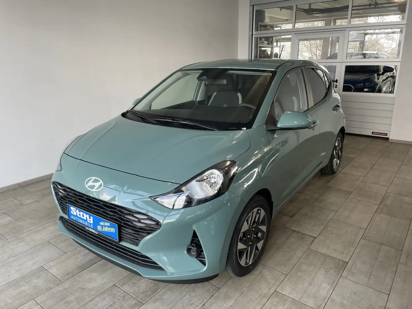 Hyundai i10 Modell 2025 1.0 AT Navi Kamera PDC SHZ Alufelgen Grün - 1