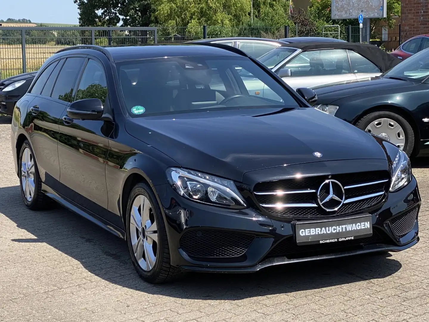 Mercedes-Benz C 220 AMG Paket / 360°/ AHK / Leder / LED / Navi ... Fekete - 2