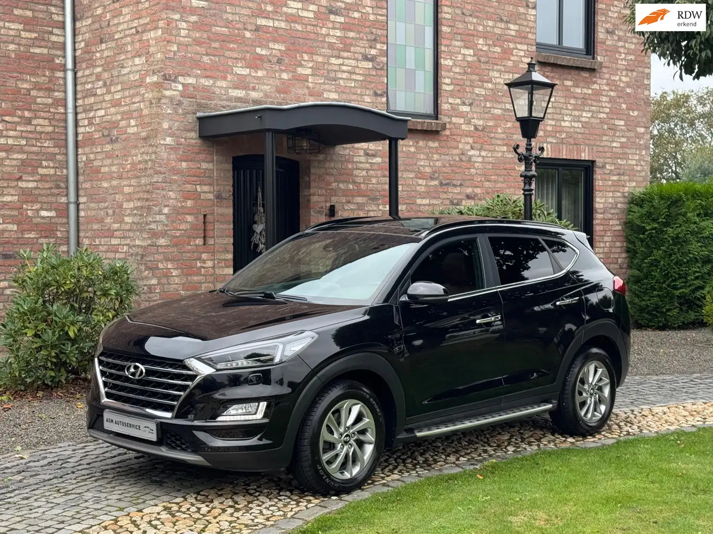Hyundai TUCSON 1.6 T-GDI Premium AUT Panodak Leder Camera Noir - 1