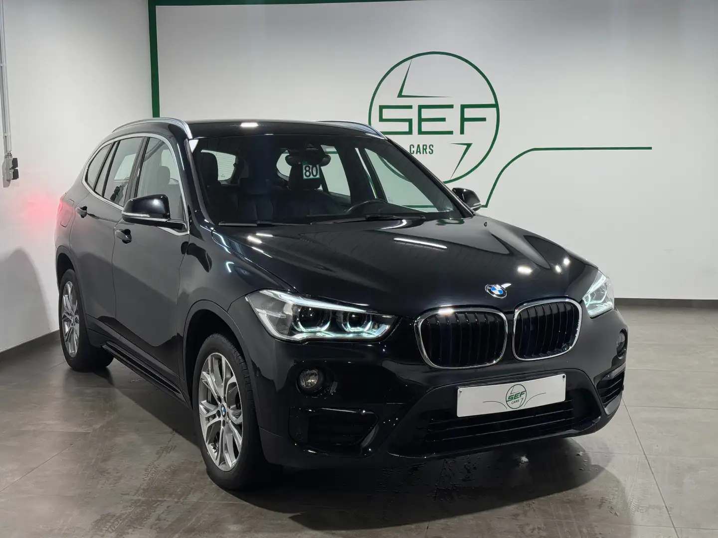BMW X1 ** 1.5iA ** sDrive18 ** GPS ** Garantie 12 mois ** Noir - 1