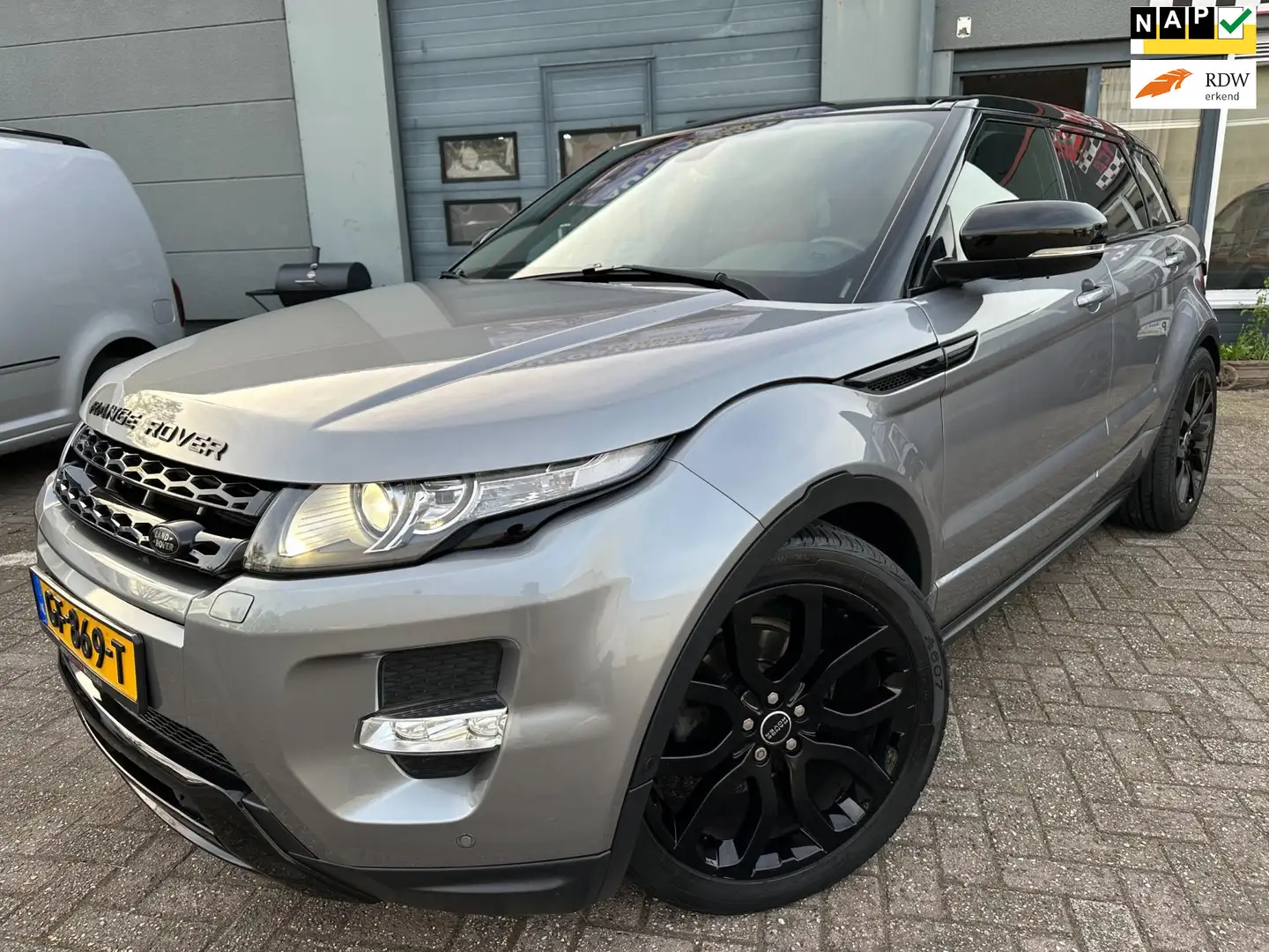 Land Rover Range Rover Evoque 2.0 Si 4WD PRESTIGE SPORT AUT SVR ZETELS LEER Grijs - 1