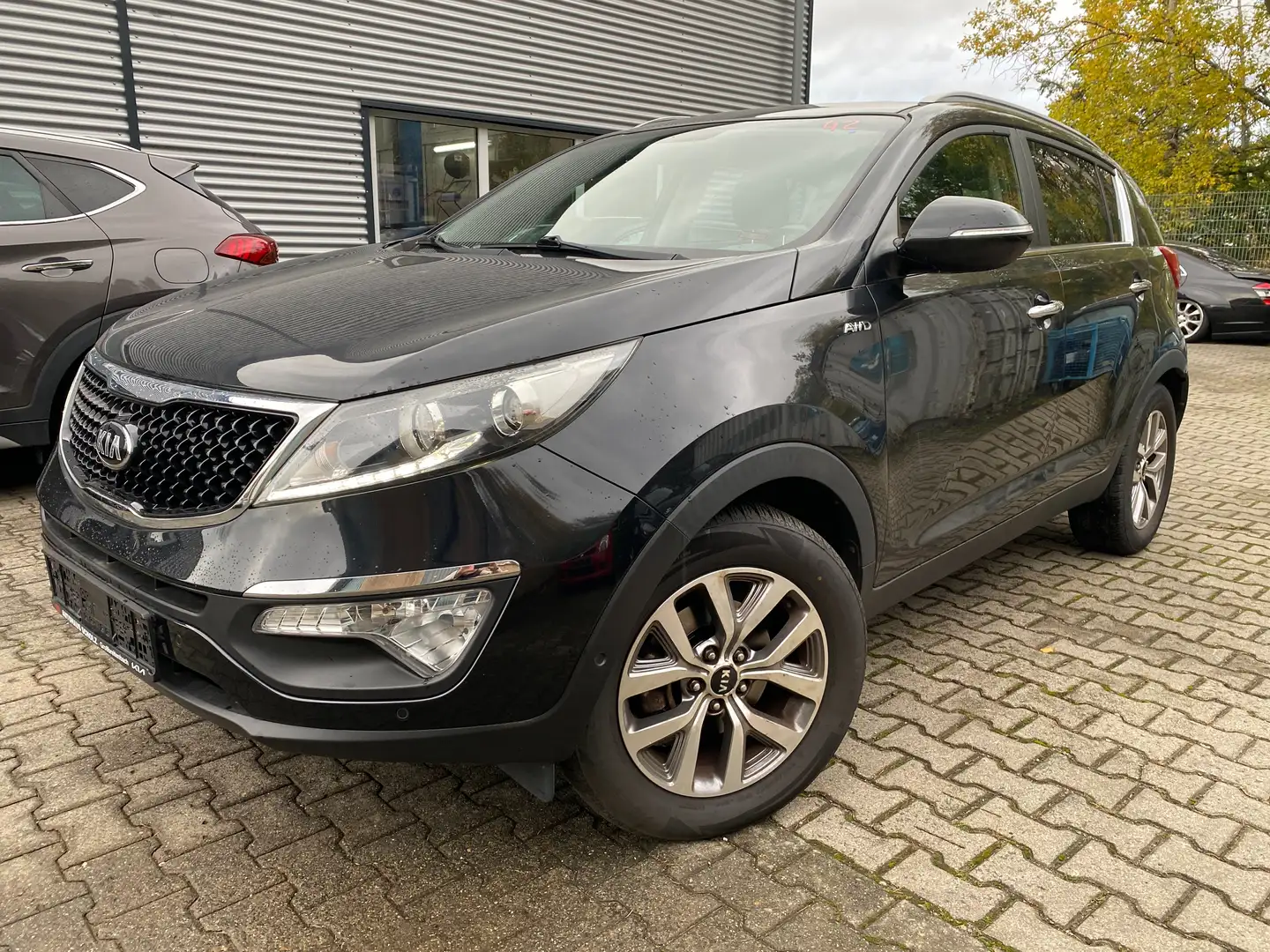 Kia Sportage 2.0 CRDi AT Dream Team 4WD AHK Scheckheft u-frei Schwarz - 1