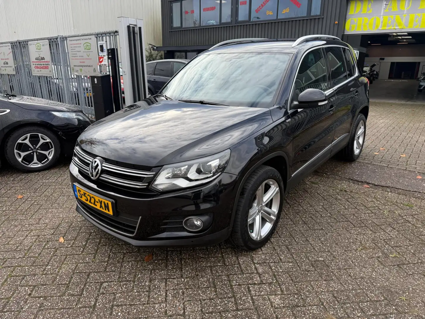 Volkswagen Tiguan 1.4 TSI Sport&Style 4Motion Zwart - 1
