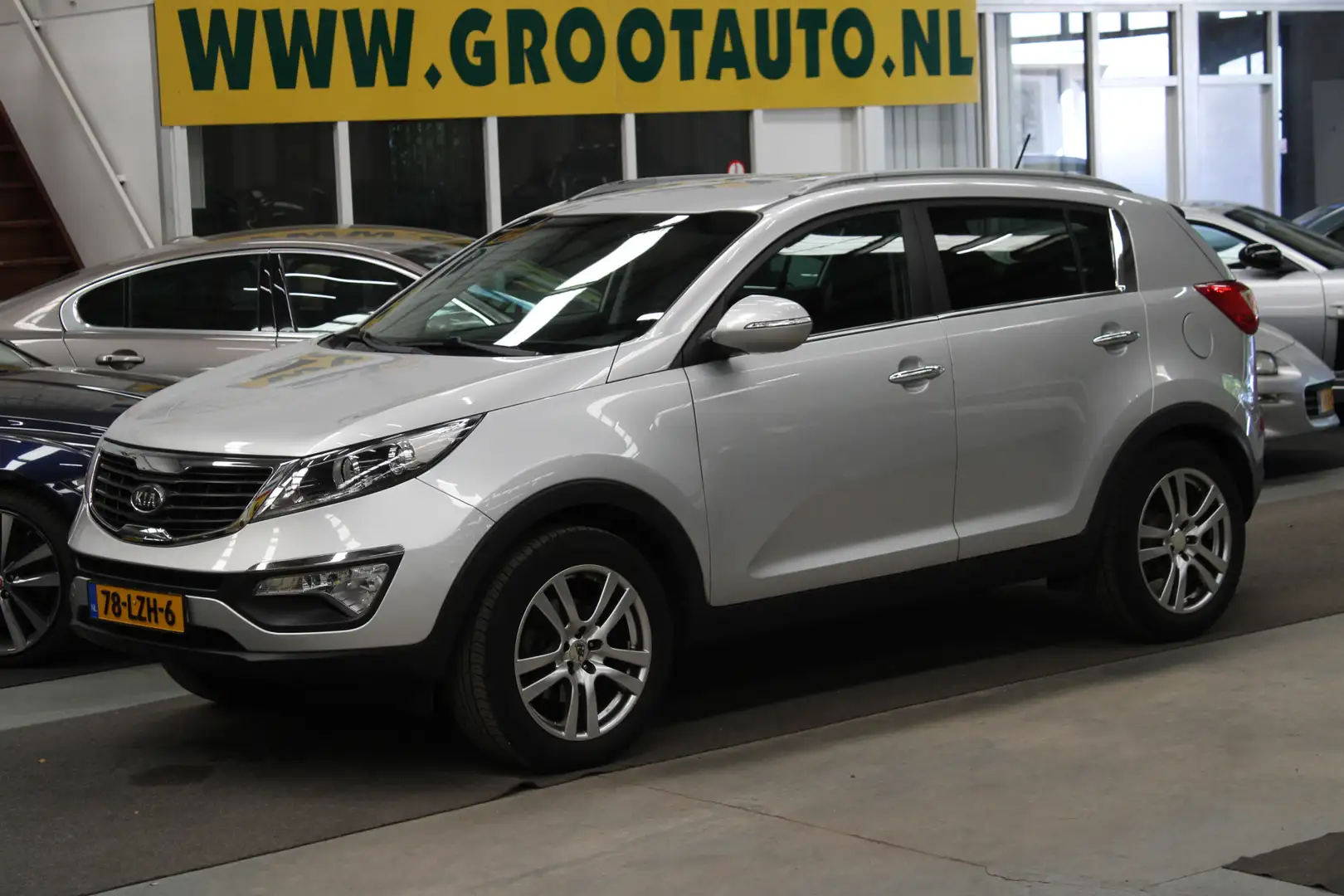 Kia Sportage 2.0 X-ecutive Plus Pack NAP, Trekhaak, Airco, Crui Gris - 1