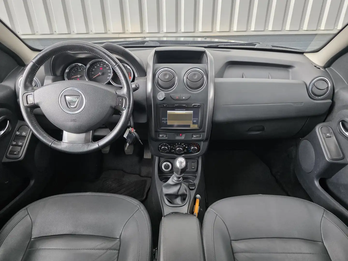 Dacia Duster 1.2 TCe 4x4 Prestige | 2e EIGENAAR | TREKHAAK | Zwart - 2