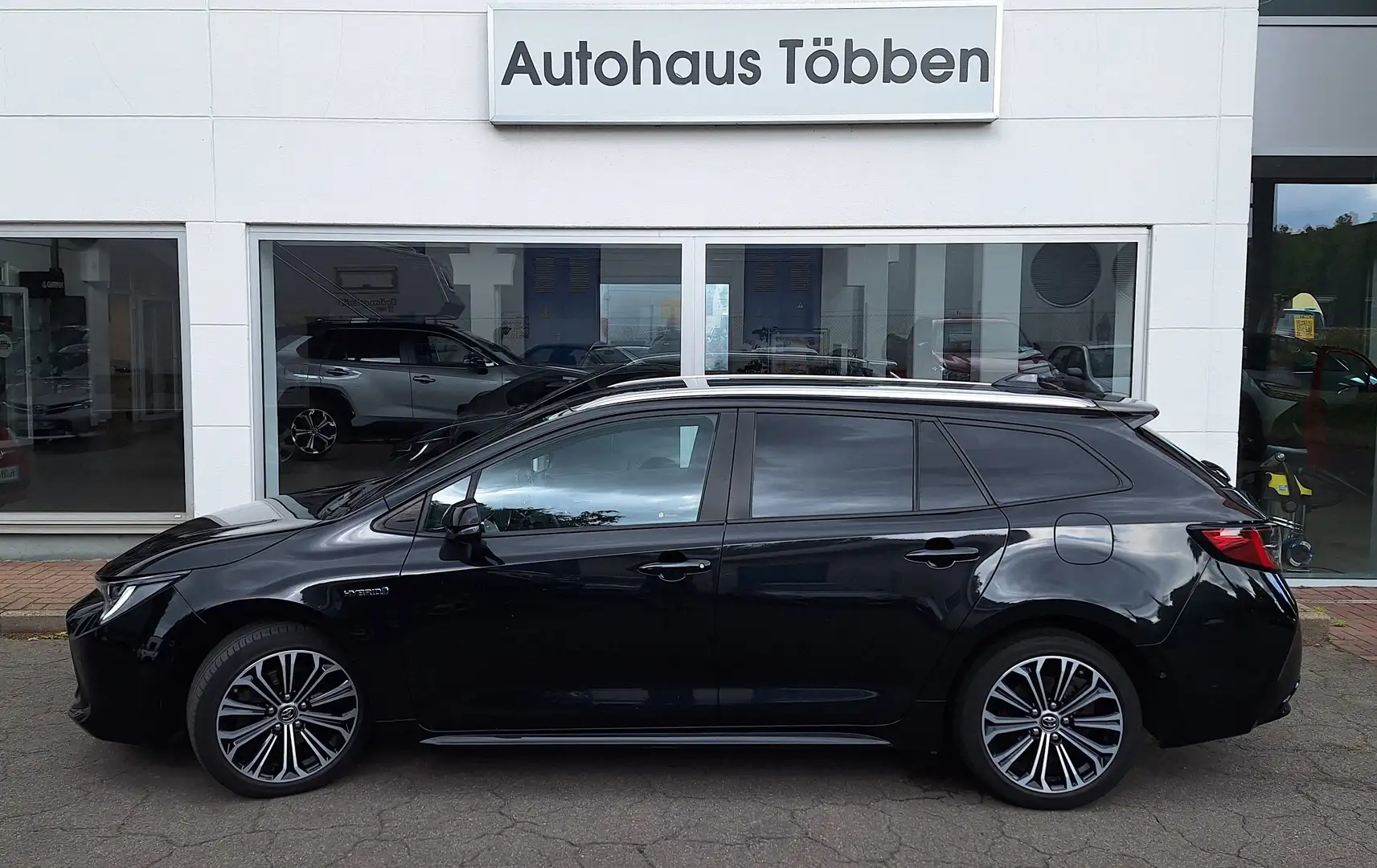 Toyota Corolla Hybrid Touring Sports Club+ Technik P.+ Garantie + Schwarz - 1