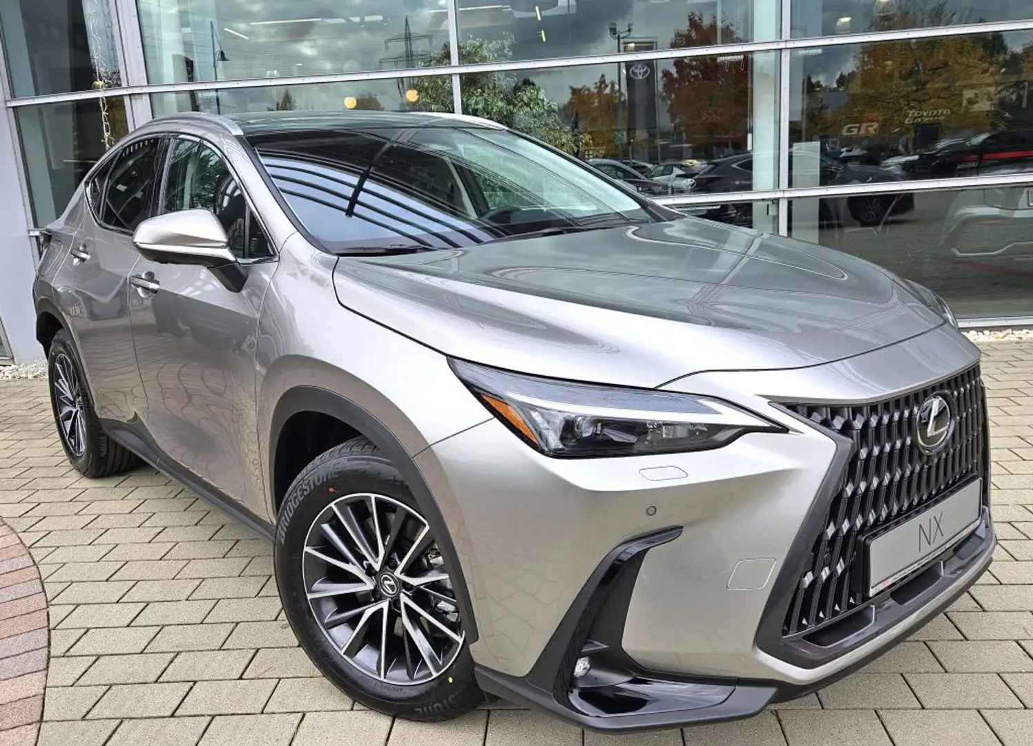 Lexus NX 450h+ E-FOUR Executive Line*Paket Interieur*Technologie- Zilver - 1