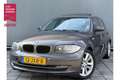 BMW 118 1-serie BWJ 2009 | 118i 143PK Business Line (LEES Bruin - thumbnail 1