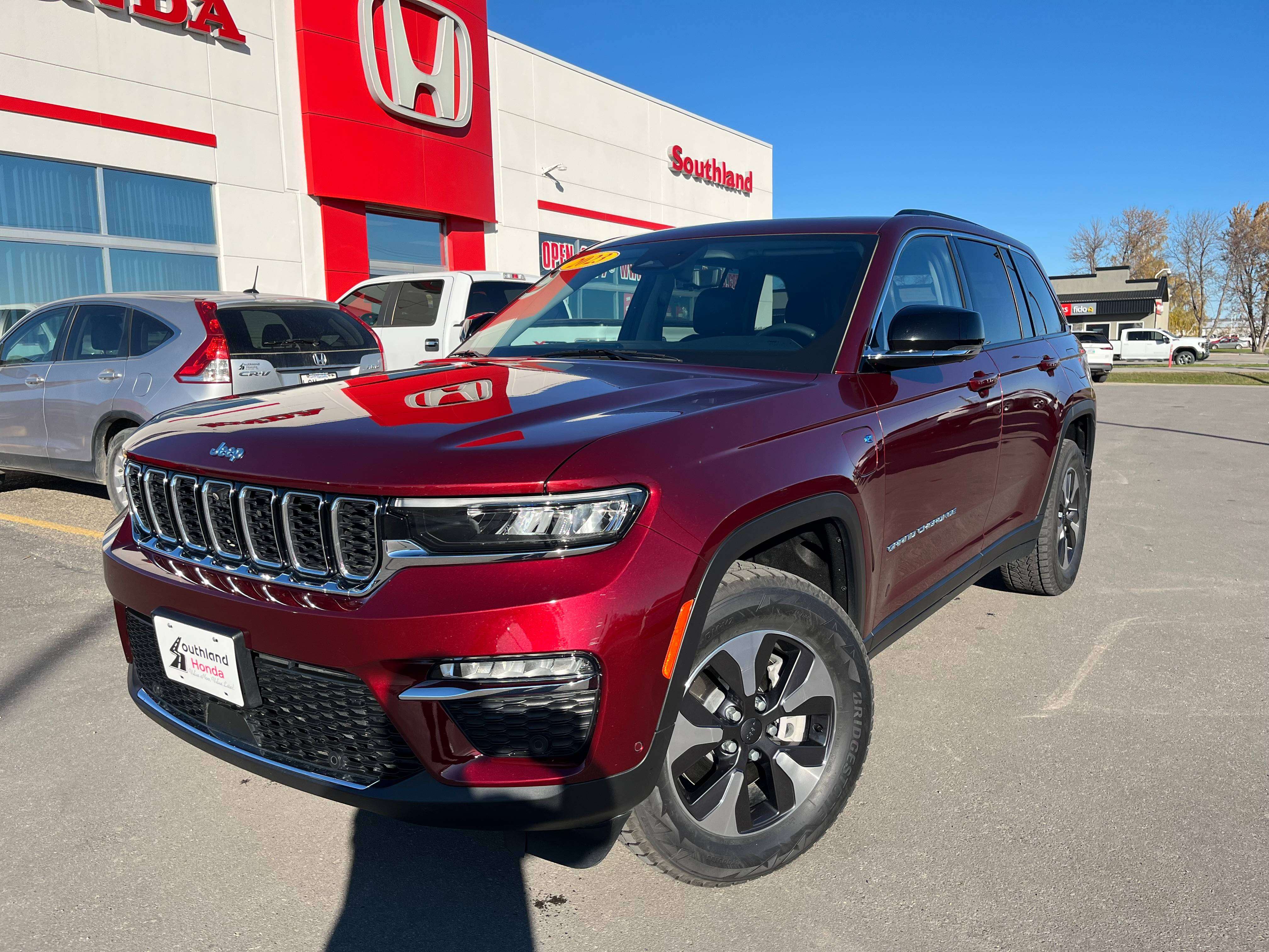 Velvet Red Pearl 2023 Jeep Grand Cherokee 4xe SUV / Crossover Four-Wheel Drive Automatic