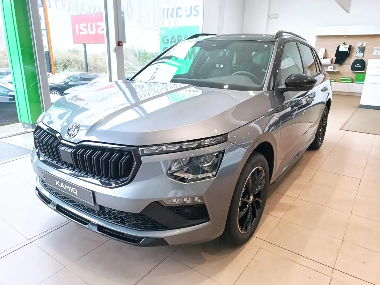 Skoda Kamiq 1.5 TSI Monte Carlo DSG7 Grijs - 1