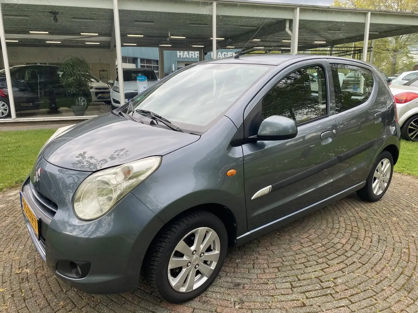Suzuki Alto 1.0 EXCLUSIVE 5DRS AIRCO Grijs - 1