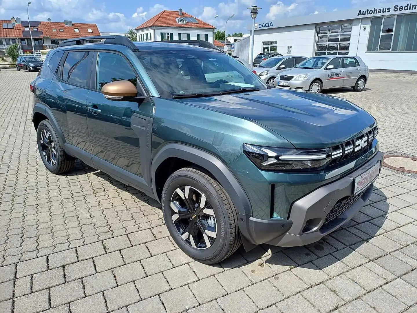 Dacia Duster Hybrid 140 Extreme Winter+City+Technik Grün - 2