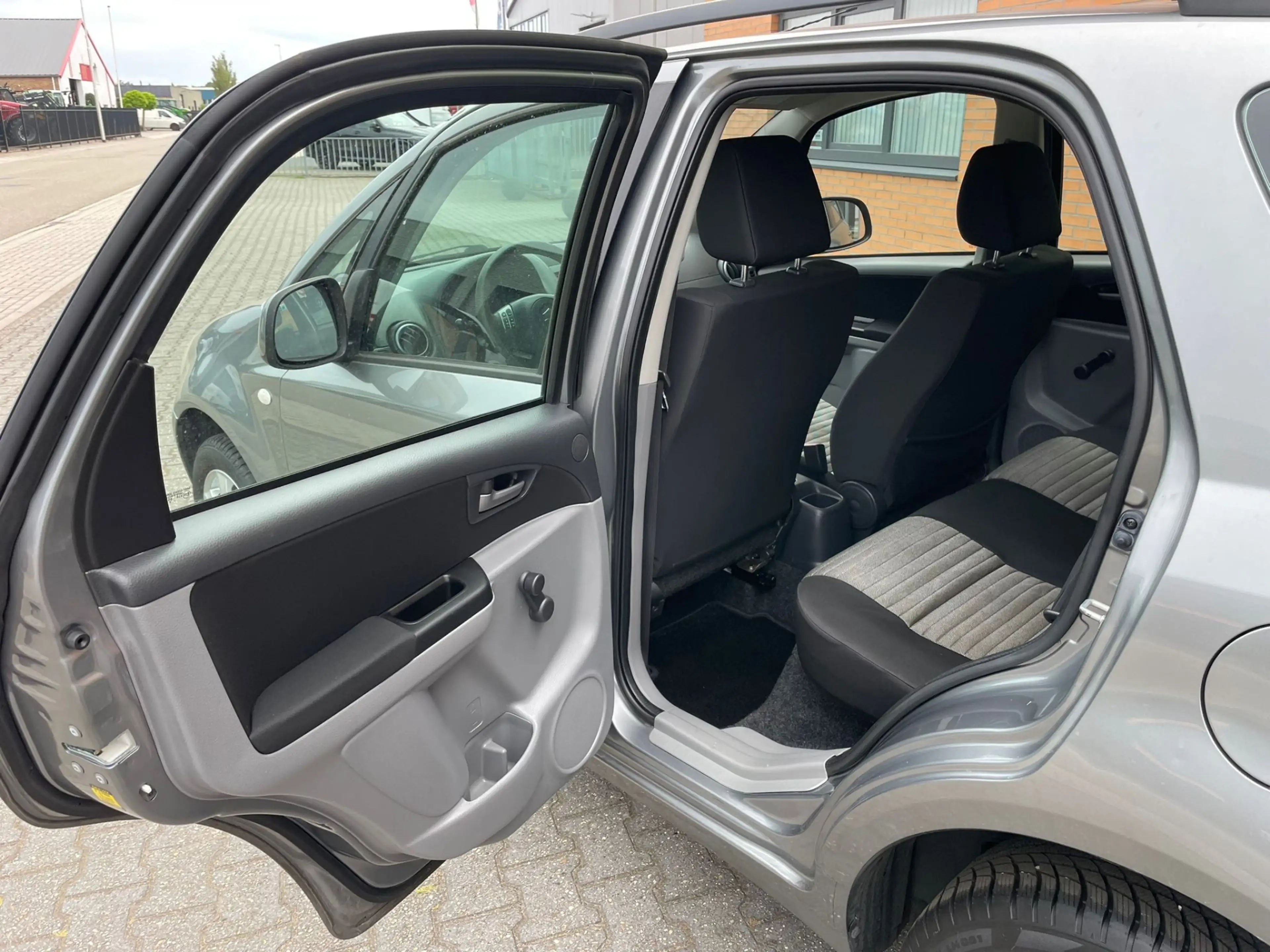 Suzuki SX4 1.6 Comfort Airco, weinig km — photo 10
