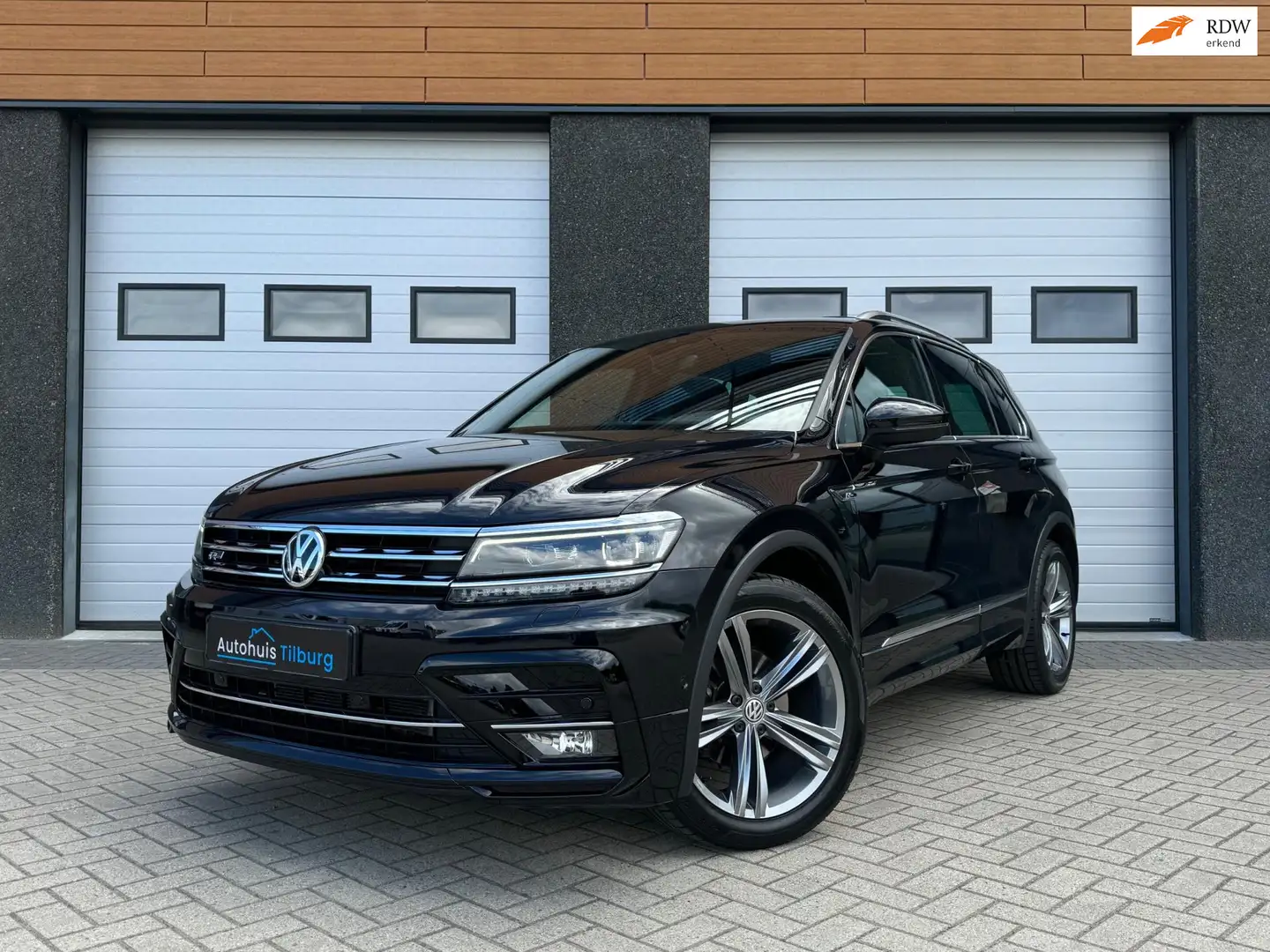 Volkswagen Tiguan 1.4 TSI 4Motion 3x R-line Pano Leder Trekhaak Noir - 1