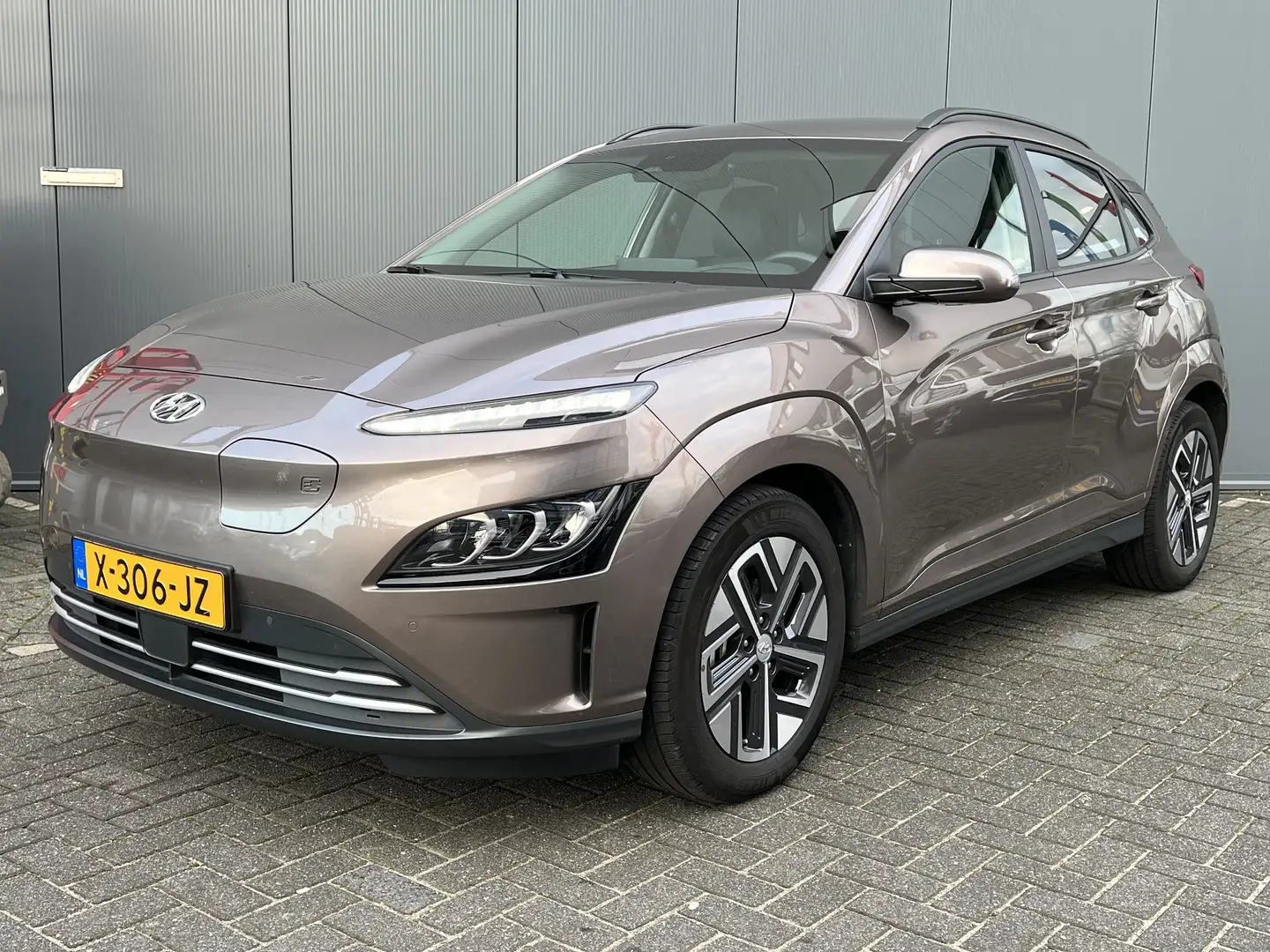 Hyundai KONA EV Premium 64 kWh 204pk | Camera | carplay | Leder Bruin - 1